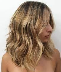 A medium layered dirty blonde look