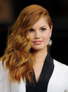 A side-swept beach waves on Debby Ryan