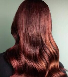 gorgeous chili chocolate wavy hair color