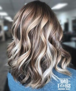 A multi-colored medium hair with a wavy touch