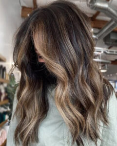 Bronze partial balayage in beach curls hairstyle