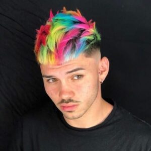 Rainbow-colored hair in a man in a black shirt