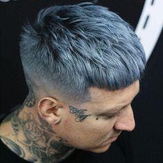  Ash blue hair color in a tattooed man
