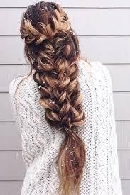 A braided shoulder length hairstyle