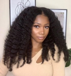 Girl poses her long afro cut